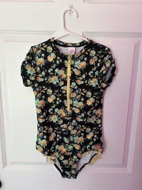 Ruffle Butts Black Floral Rashguard Swimsuit with Yellow Zipper